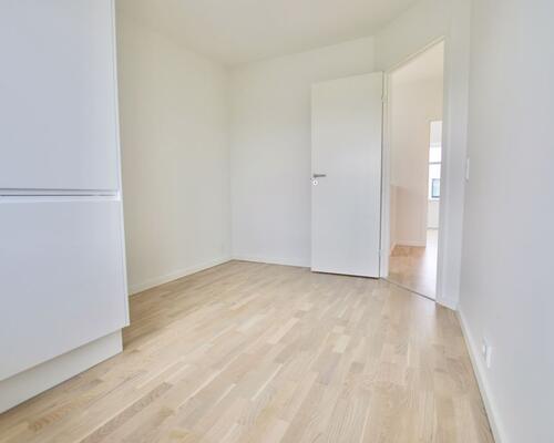 Fritliggende 4-værelses rækkehus på Marshalls Alle