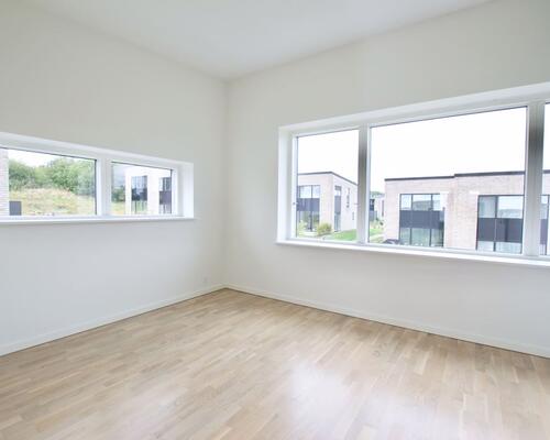 Fritliggende 4-værelses rækkehus på Marshalls Alle