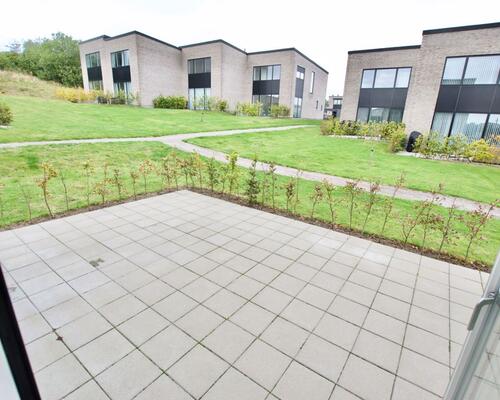 Fritliggende 4-værelses rækkehus på Marshalls Alle