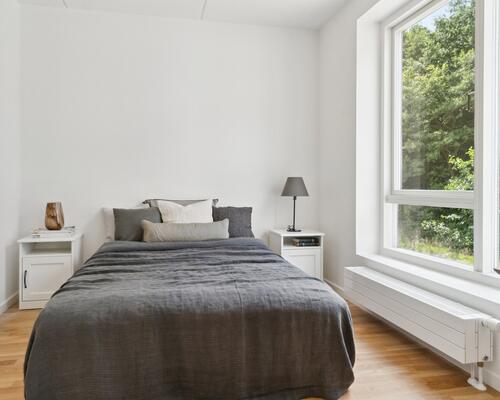 Skøn 4-værelses med træterrasse og have