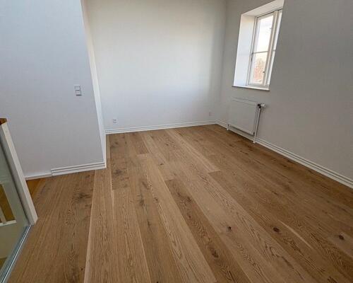 Charmerende 3. værelses herskabslejlighed