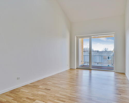 Bygården - Modern lejlighed i lækre materialer med plads til familien