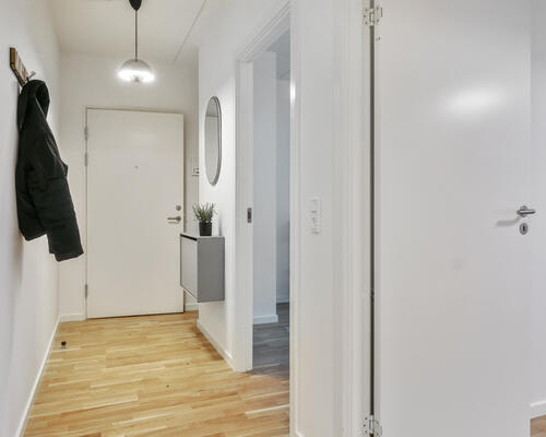 Nyopført 4-værelses lejlighed i Brokvarteret med depotrum