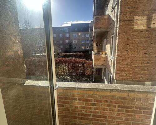 Lys og velindrettet lejlighed med central placering