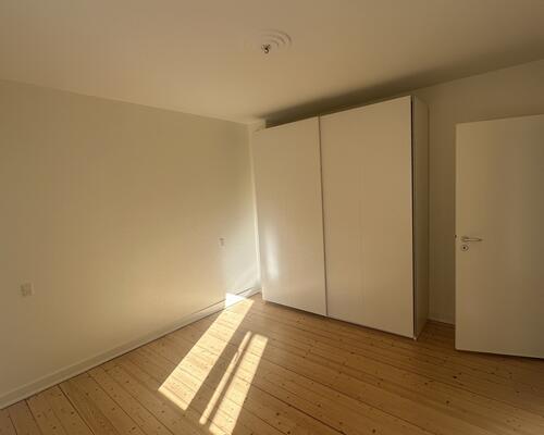 Lys og velindrettet lejlighed med central placering