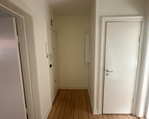 Lys og velindrettet lejlighed med central placering