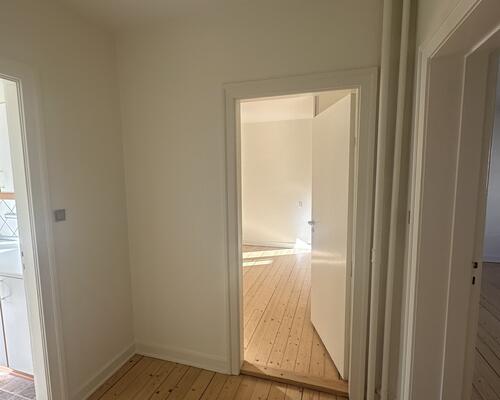 Lys og velindrettet lejlighed med central placering