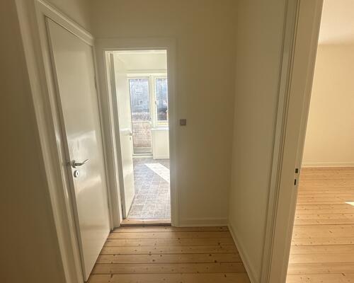 Lys og velindrettet lejlighed med central placering