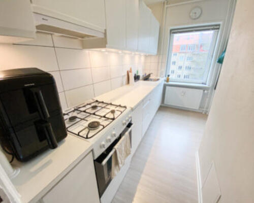 Lækker 2-værelses lejlighed i Øgadekvarteret