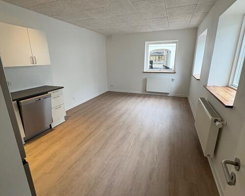 Nyere 2 værelses lejlighed i baggård