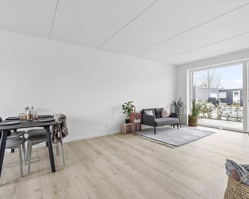 Lækker 2-vær. lejlighed i stueplan med egen terrasse i nyopført ejendom i Hasselager.