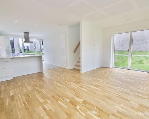 Fritliggende 4-værelses rækkehus på Marshalls Alle