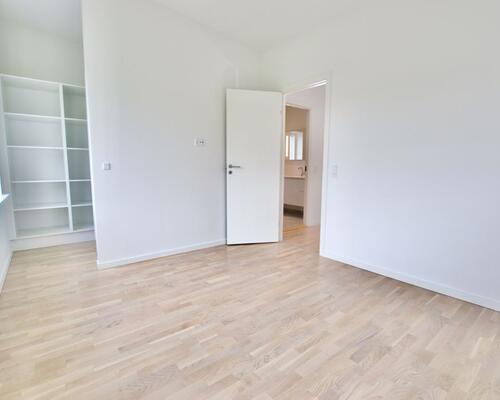 Fritliggende 4-værelses rækkehus på Marshalls Alle