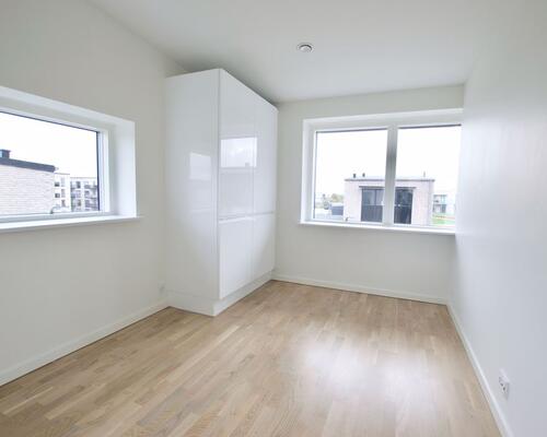 Fritliggende 4-værelses rækkehus på Marshalls Alle