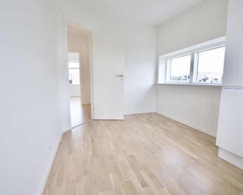 Fritliggende 4-værelses rækkehus på Marshalls Alle