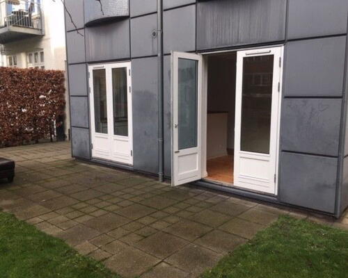 Rummelig 3-værelses på 108 m2 med gårdudgang, rå murstensvægge og opvaskemaskine i Aalborg C