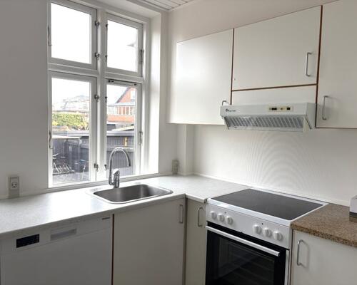 Lys og charmerende 3 værelses lejlighed på lukket villavej centralt i Nyborg -78 Kvm