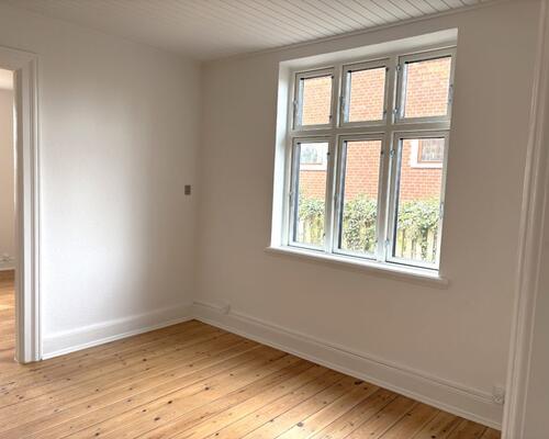 Lys og charmerende 3 værelses lejlighed på lukket villavej centralt i Nyborg -78 Kvm