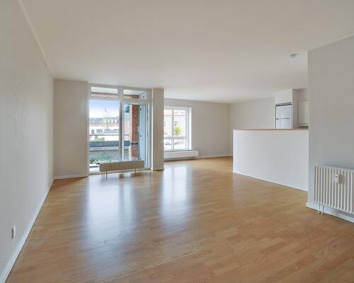 Vil du bo i en attraktiv ejendom helt centralt?