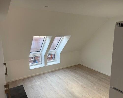 Mega hyggelig og med altan.