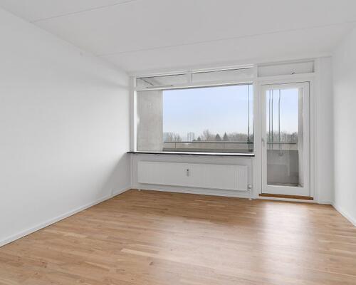 Flot og velindrettet 2-værelses lejlighed med stor altan – lige ved Botanisk Have