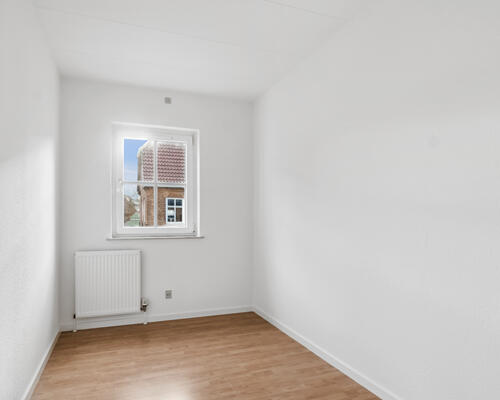 Charmerende og moderne bolig med altan