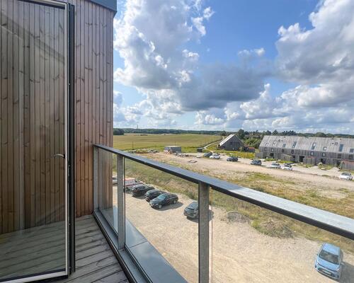 Fantastisk lejlighed med 3 altaner, atriumgård og panoramaudsigt