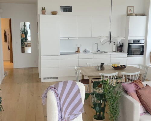 Eksklusiv penthouse med stor tagterrasse og fjordudsigt