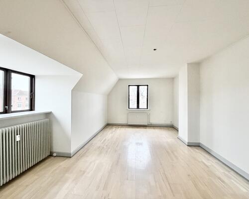 Charmerende 2 værelses lejlighed i hjertet af Odense C