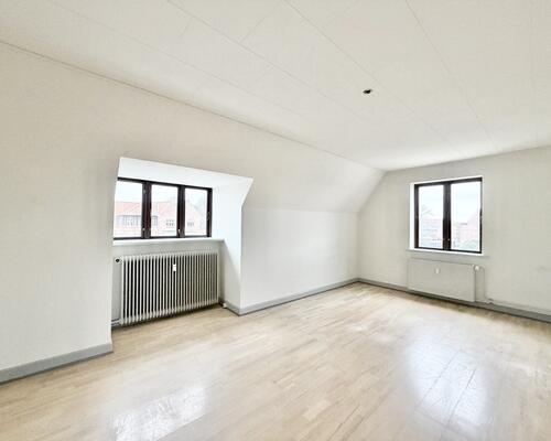 Charmerende 2 værelses lejlighed i hjertet af Odense C