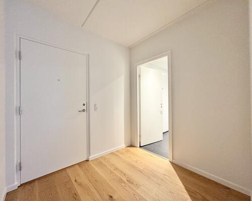 Lys og indbydende seniorbolig i naturskønne Munkebjerg Park