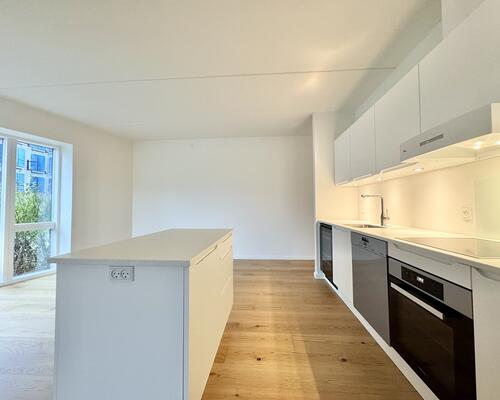 Lys og indbydende seniorbolig i naturskønne Munkebjerg Park