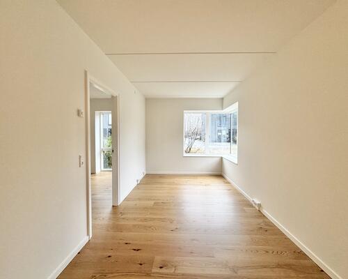 Lys og indbydende seniorbolig i naturskønne Munkebjerg Park