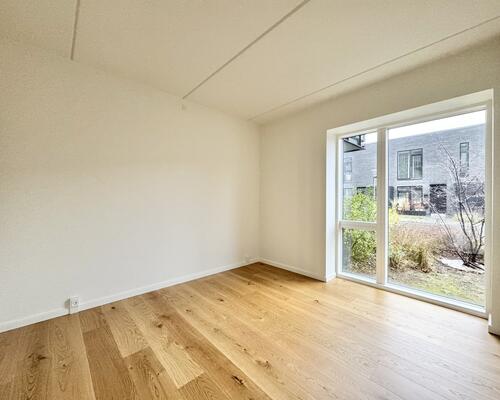 Lys og indbydende seniorbolig i naturskønne Munkebjerg Park