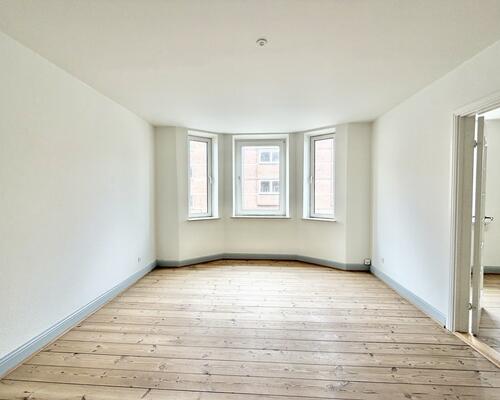 Indbydende 3 værelses lejlighed med central beliggenhed i Odense C