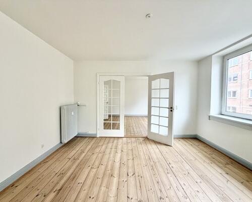 Indbydende 3 værelses lejlighed med central beliggenhed i Odense C