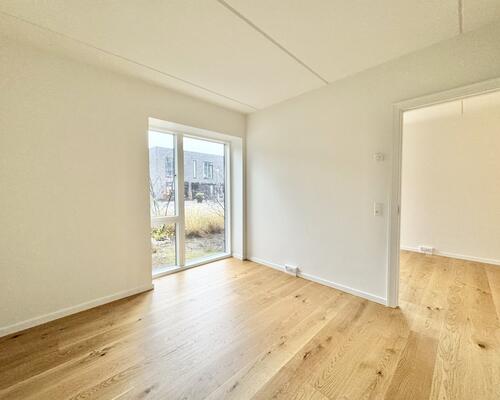 Lys og moderne seniorbolig med skøn terrasse i Odense M