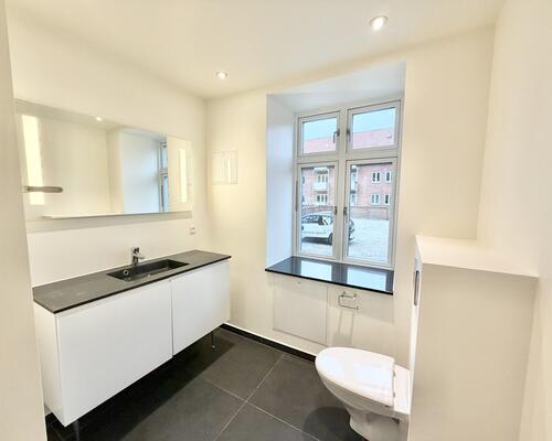 Lys og indbydende lejlighed i hjertet af Odense C