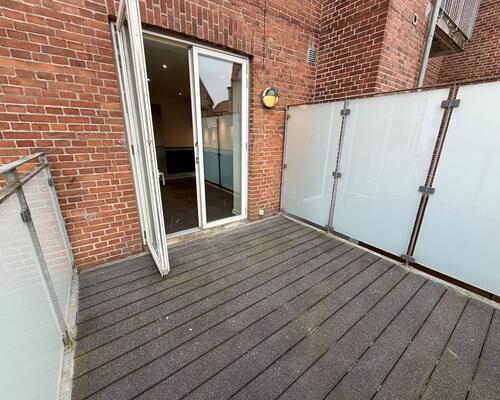 Lys og indbydende lejlighed i hjertet af Odense C