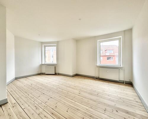 Indbydende 2 værelses lejlighed med moderne detaljer i Odense C