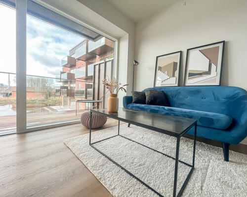 Lys 4-værelses lejlighed på 1. sal!