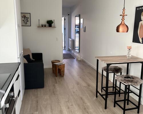 Stue lejlighed med lækker terrasse