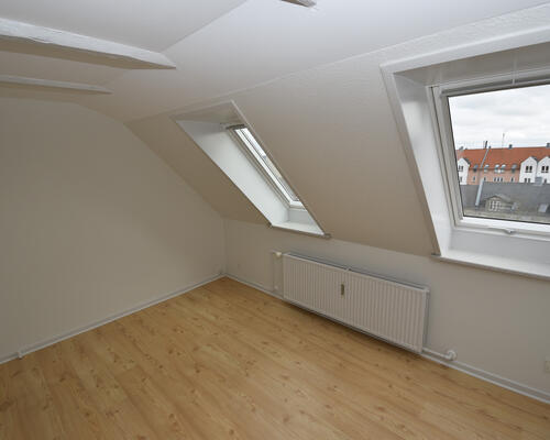 Charmerende taglejlighed med lys og atmosfære i Aalborg