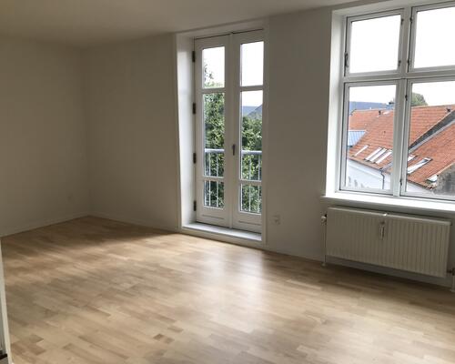 Flot lejlighed centralt i Kolding med fælles have og mulighed for vaskesøjle