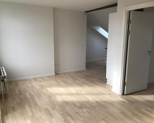 Flot lejlighed centralt i Kolding med fælles have og mulighed for vaskesøjle