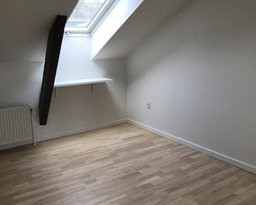 Flot lejlighed centralt i Kolding med fælles have og mulighed for vaskesøjle