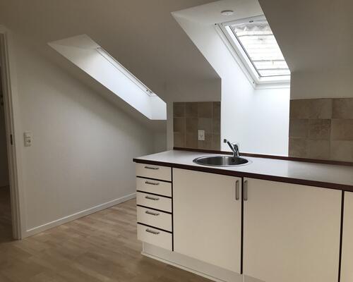 Flot lejlighed centralt i Kolding med fælles have og mulighed for vaskesøjle