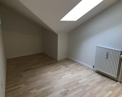 Flot lejlighed centralt i Kolding med fælles have og mulighed for vaskesøjle