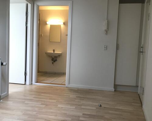 Flot lejlighed centralt i Kolding med fælles have og mulighed for vaskesøjle