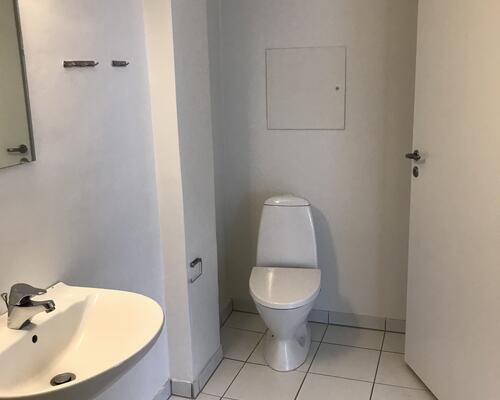 Flot lejlighed centralt i Kolding med fælles have og mulighed for vaskesøjle